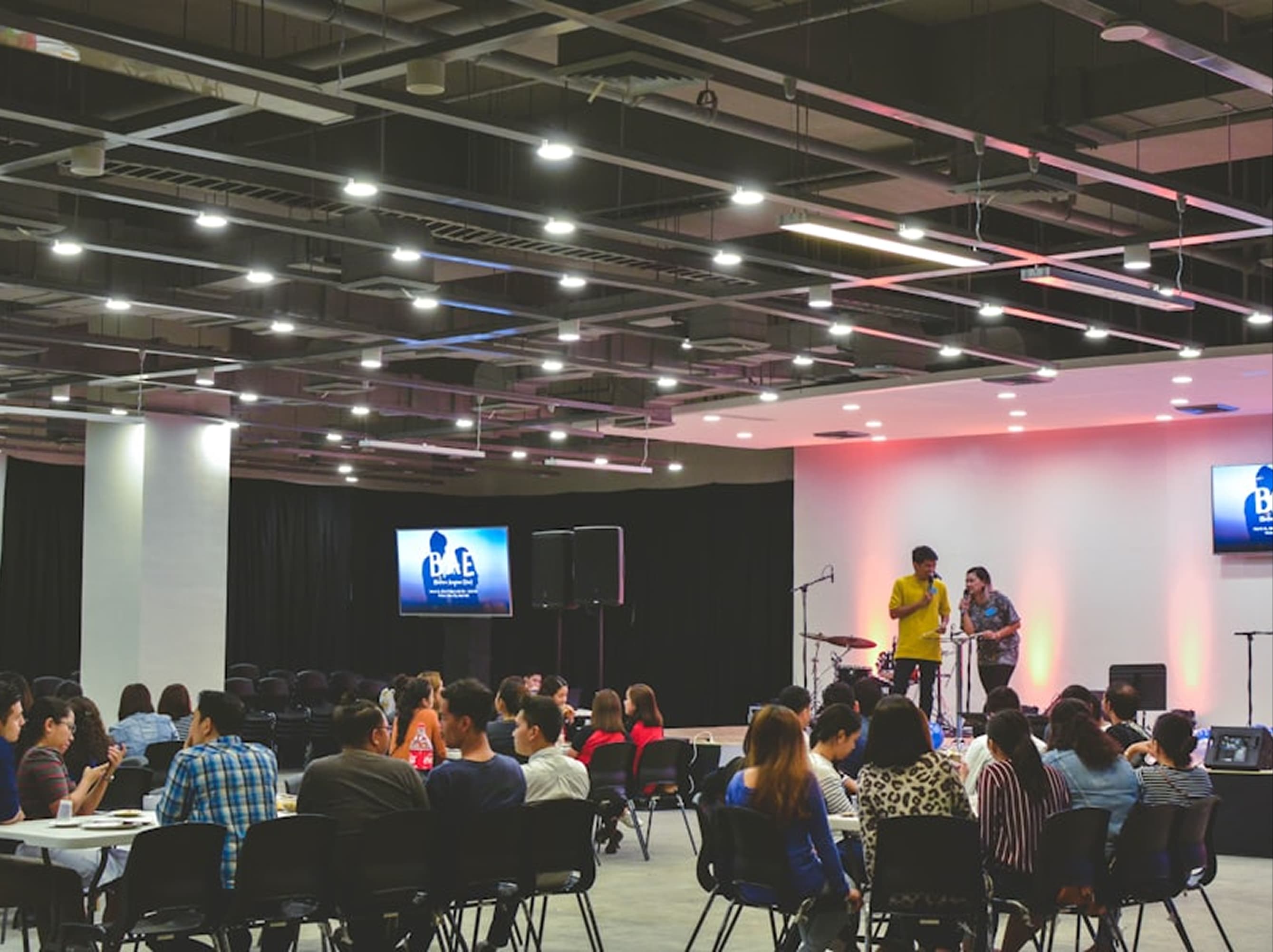 Audience and stage at the FrameBoxx Pune campus launch event