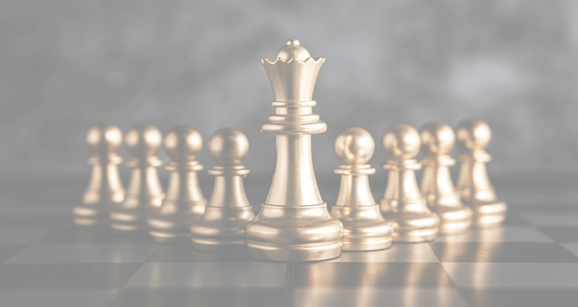 Gold chess pieces symbolizing Frameboxx leadership and strategy