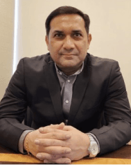 Portrait of Ravi Gupta, CEO, Director