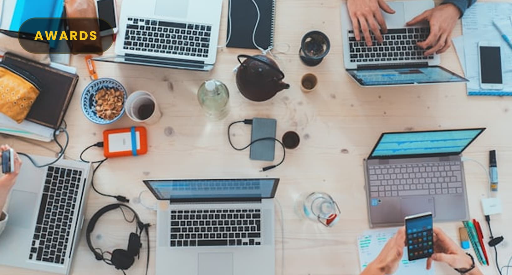 AWARDS — Collaborative workspace representing FrameBoxx student awards